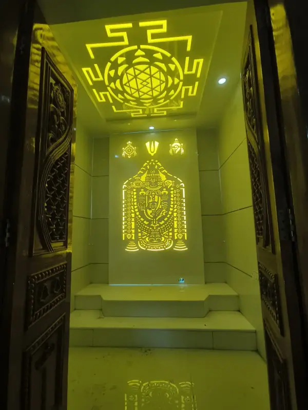 Hebbal home interior – pooja room with backlit deity panel and Sri Yantra false ceiling